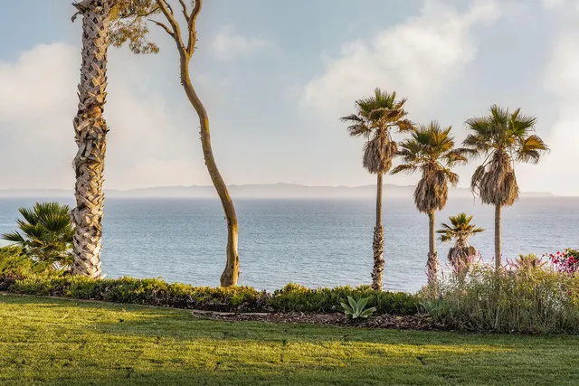 a view of a lake with a nearby beach