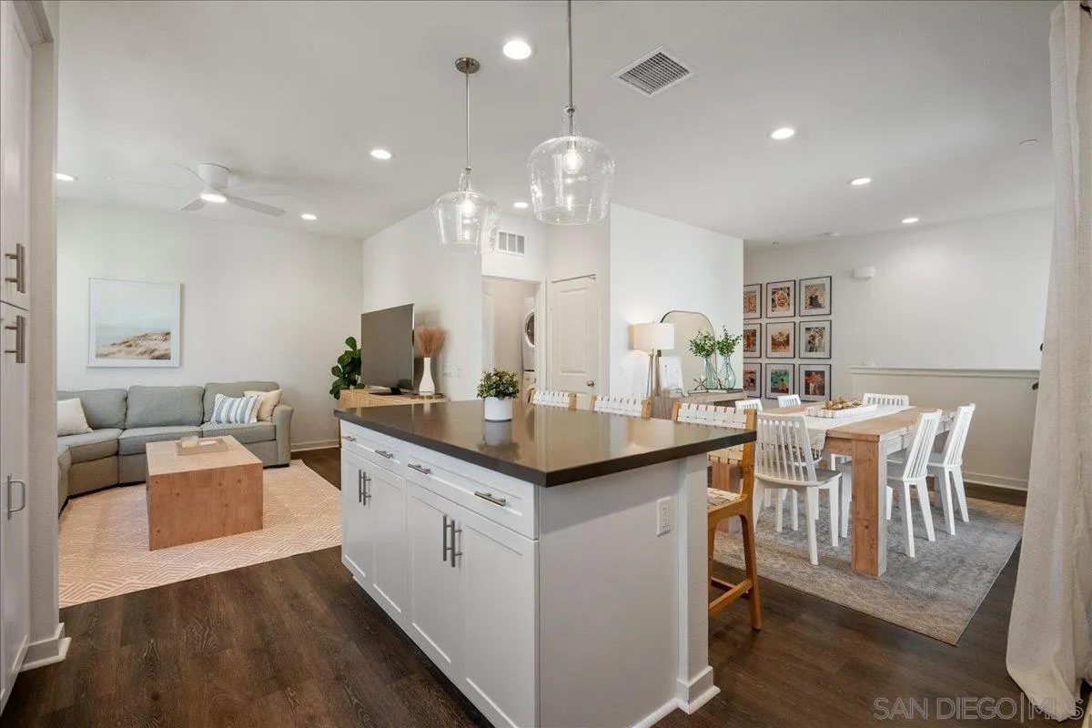 328 Paddle Court Santee, CA 92071 - Photo 16 of 45 a kitchen with center island table and chairs in it