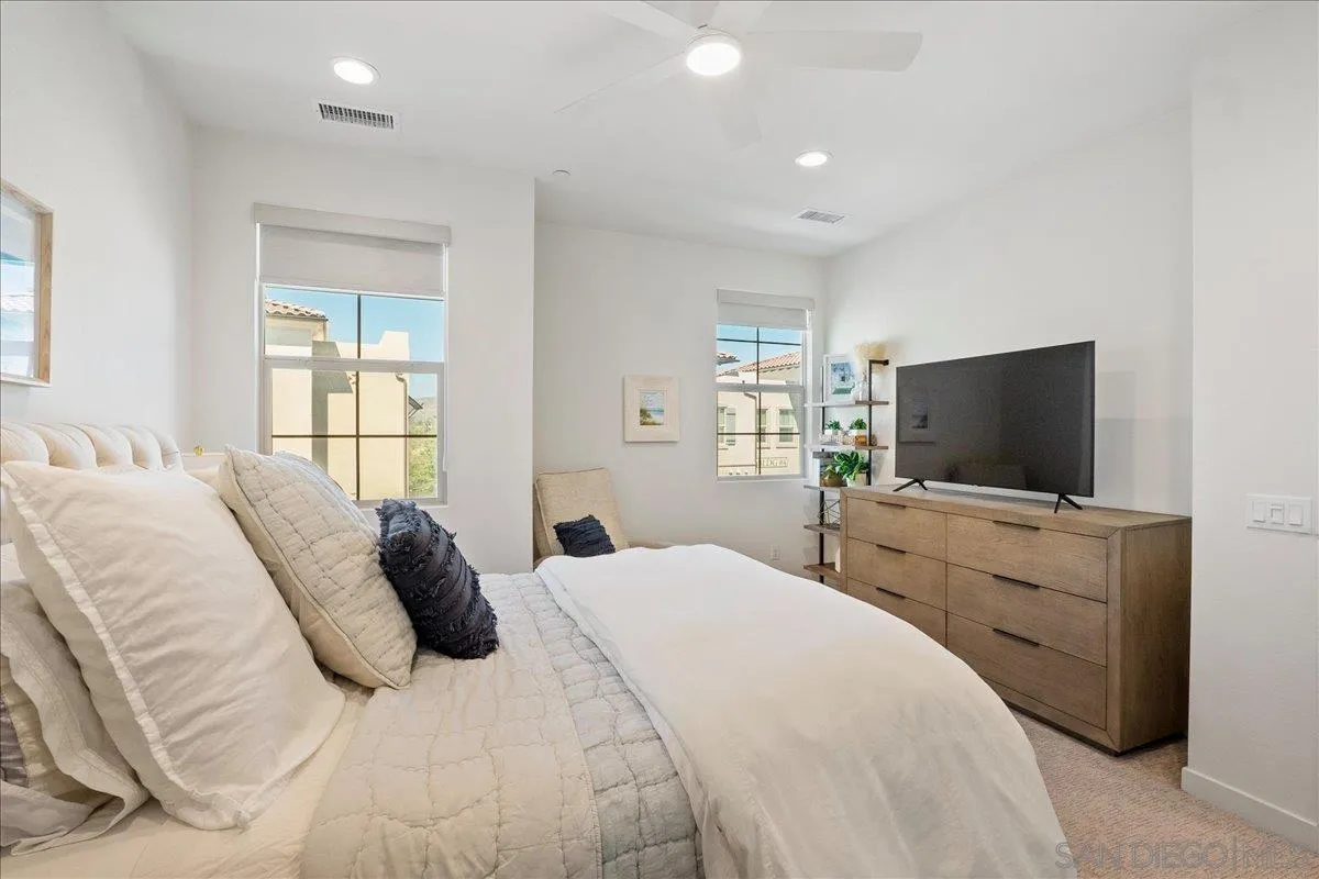 328 Paddle Court Santee, CA 92071 - Photo 24 of 45 a bedroom with a bed and a flat screen tv