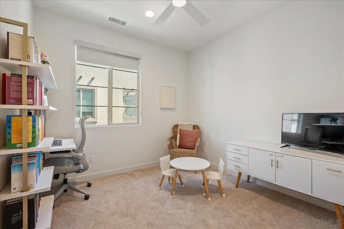 328 Paddle Court Santee, CA 92071 - Photo 28 of 45 a room with a chair and gym equipment