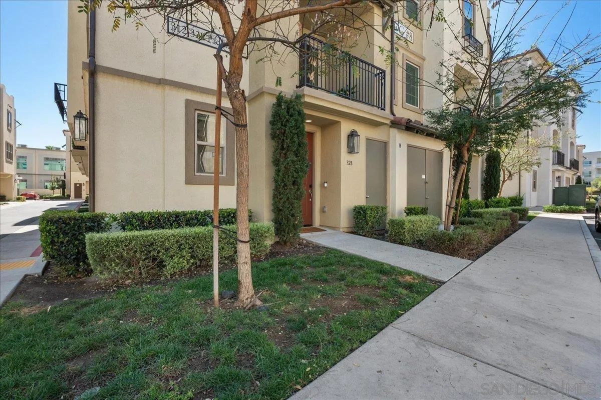 328 Paddle Court Santee, CA 92071 - Photo 3 of 45 a view of a white house next to a yard with potted plants