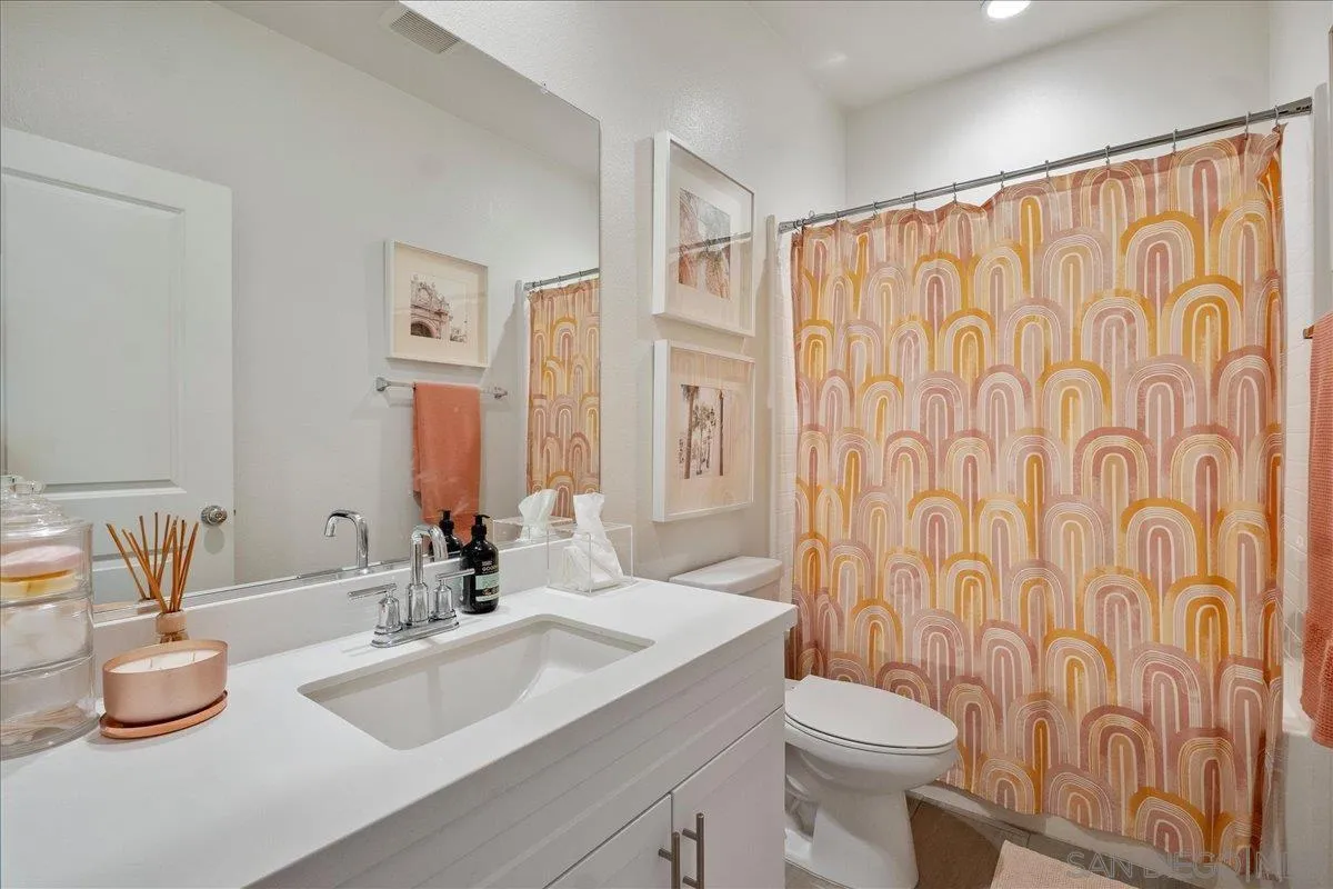 328 Paddle Court Santee, CA 92071 - Photo 31 of 45 a bathroom with a granite countertop sink and a mirror