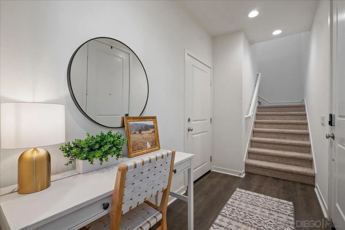 328 Paddle Court Santee, CA 92071 - Photo 7 of 45 a workspace with furniture and a potted plant