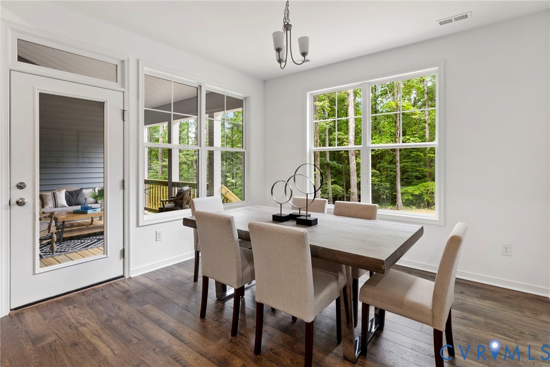 13030 Alsandair Drive Chesterfield, VA 23838 - Photo 17 of 33 Dining room featuring dark wood-style flooring and
