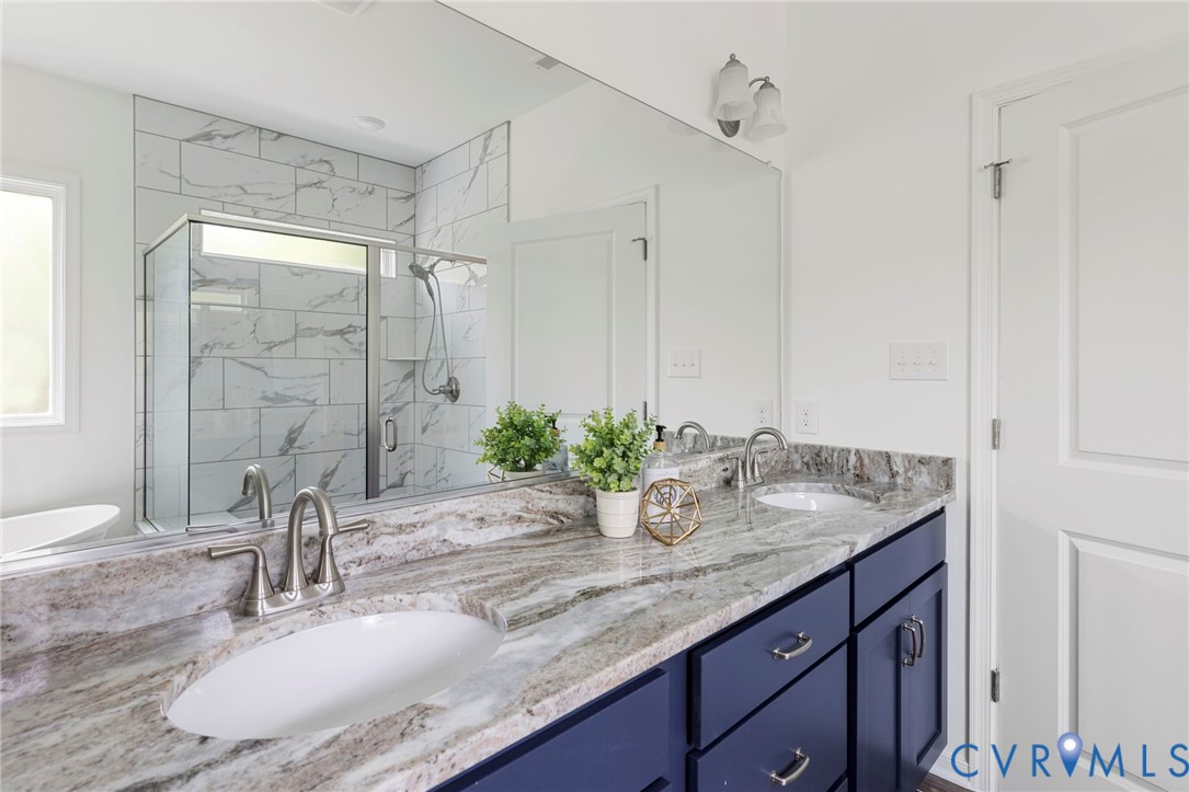 13030 Alsandair Drive Chesterfield, VA 23838 - Photo 21 of 33 Full bathroom featuring double vanity and a marble