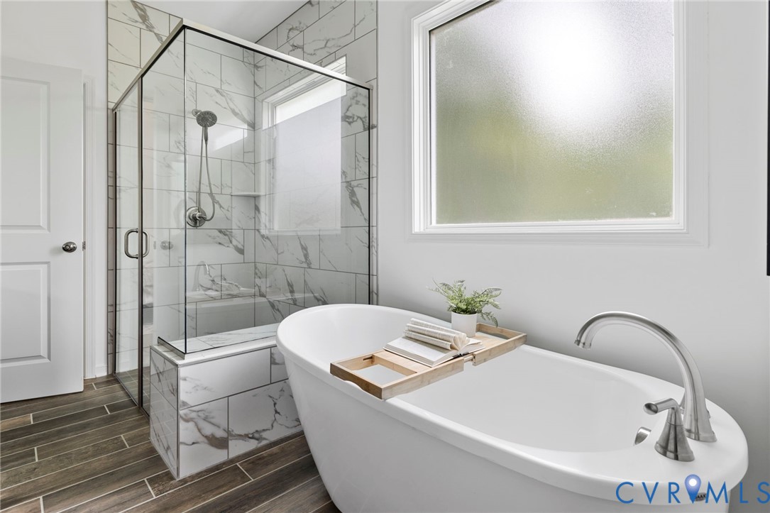 13030 Alsandair Drive Chesterfield, VA 23838 - Photo 22 of 33 Bathroom with a soaking tub, a shower stall, and w