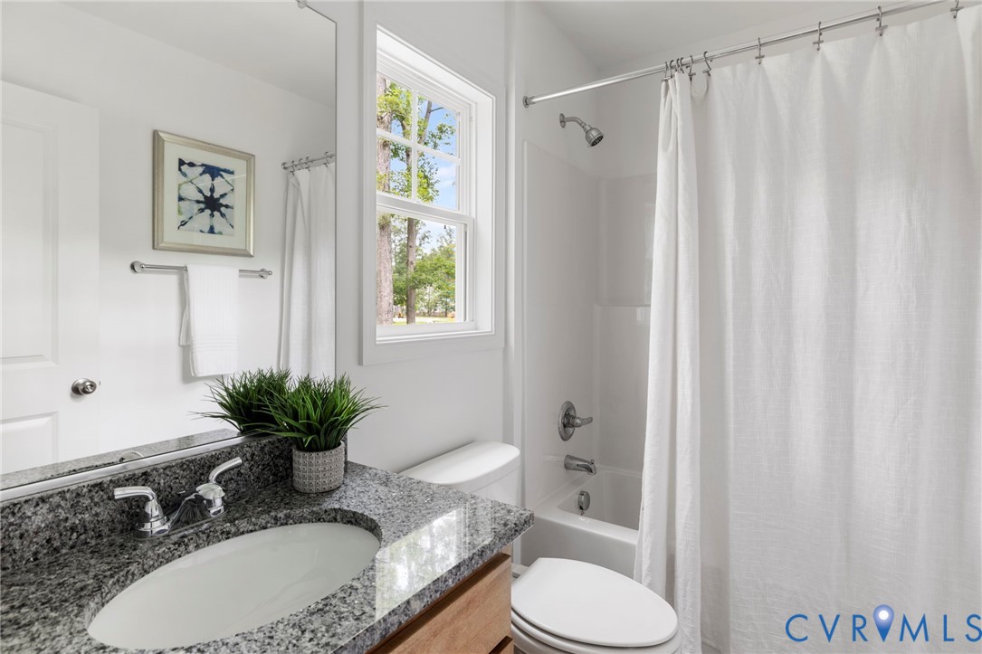 13030 Alsandair Drive Chesterfield, VA 23838 - Photo 29 of 33 Bathroom with vanity and shower / bath combo