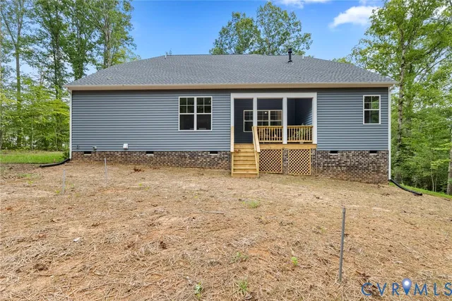 a house with yard in front of it