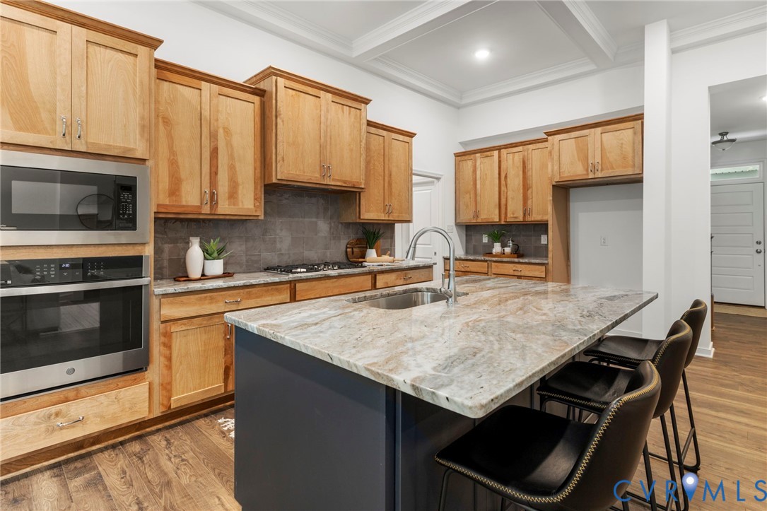13030 Alsandair Drive Chesterfield, VA 23838 - Photo 6 of 33 Kitchen with oven, backsplash, built in microwave,