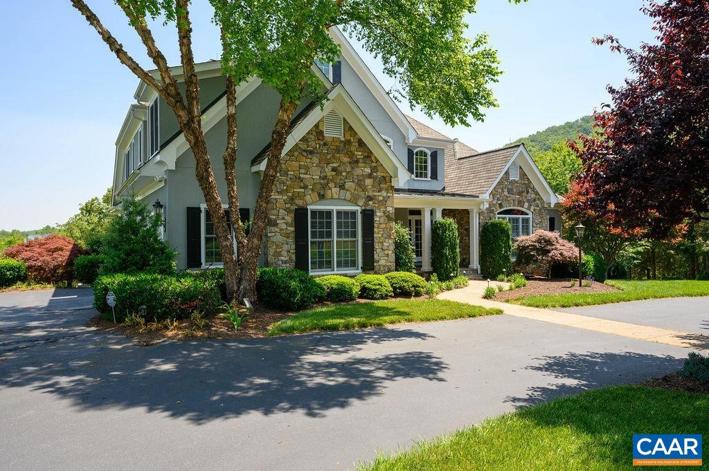 3470 Rocks Mill Lane Charlottesville, VA 22903 - Photo 4 of 72 a front view of a house with a yard and shrubs