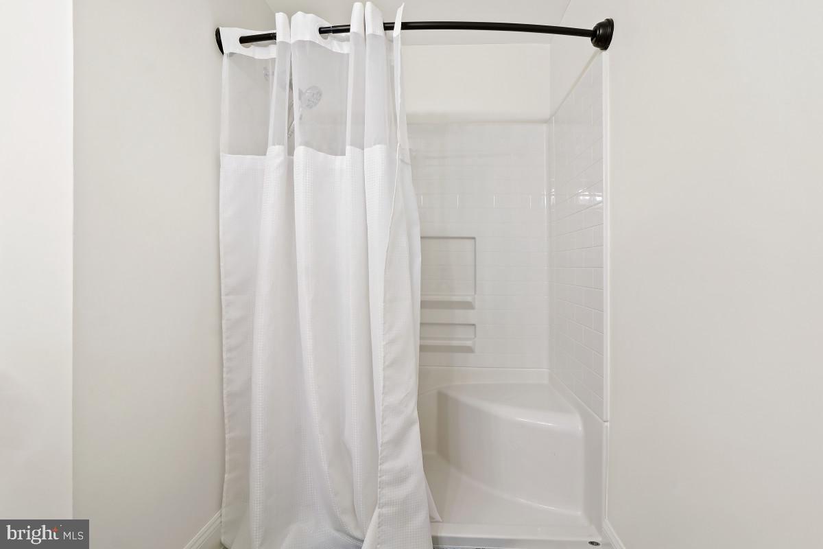 1515 Church Hill Place Reston, VA 20194 - Photo 22 of 28 Full bath with walk-in shower with seat
