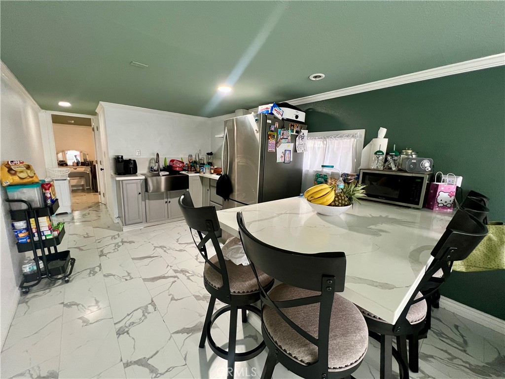 4849 Peck Road, Unit 48 El Monte, CA 91732 - Photo 4 of 11 a view of a dining room with furniture