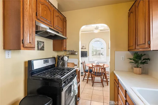 a kitchen with a table and chairs