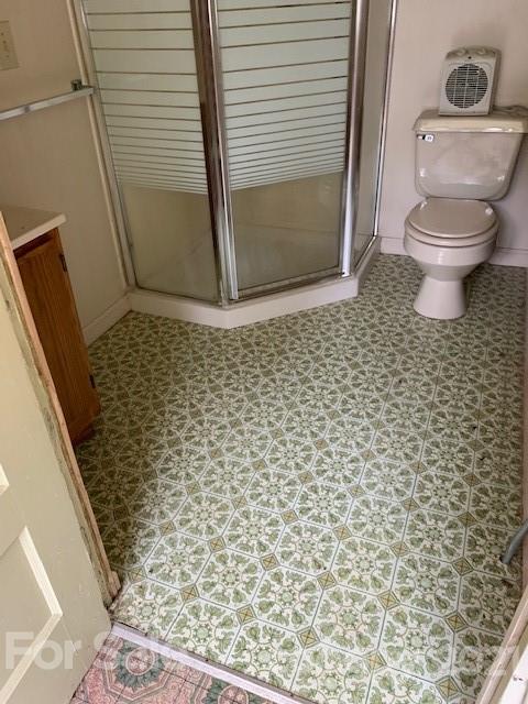 4613-4617 Fallston Road Fallston, NC 28090 - Photo 11 of 21 a bathroom with a toilet and a shower