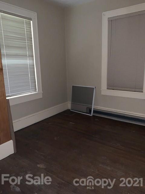4613-4617 Fallston Road Fallston, NC 28090 - Photo 17 of 21 a view of wooden floor and a window in an empty room