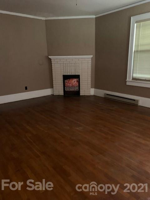 4613-4617 Fallston Road Fallston, NC 28090 - Photo 21 of 21 an empty room with wooden floor and windows