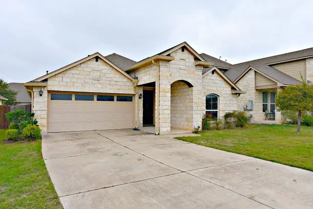 a view of house with garden