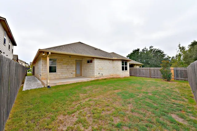 a house view with a garden space