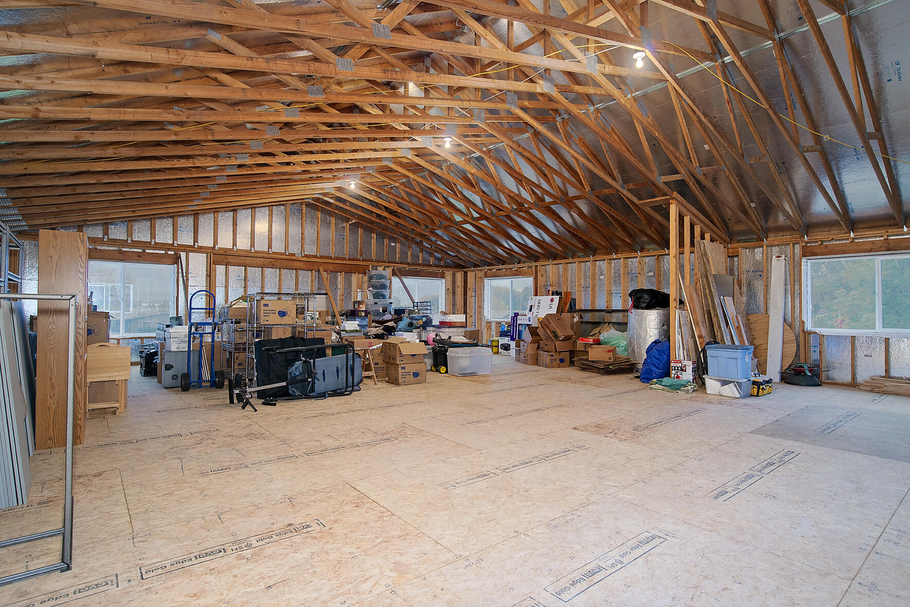 646 Raven Road Central Point, OR 97502 - Photo 63 of 74 Above the garage is an unfinished bonus room that is 1440 sq ft with 12 ft vaulted ceilings and looking out to Mt Mclaughlin; this is in addition to the sq ft of the home.