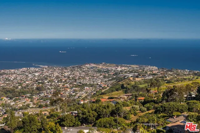 a backyard of a house with seating space