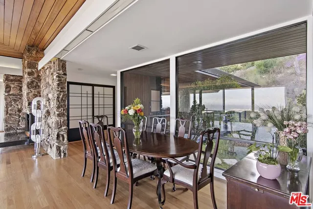 a kitchen with a sink and a stove top oven