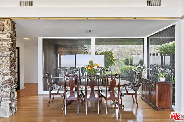 a kitchen with stainless steel appliances granite countertop a stove and a microwave
