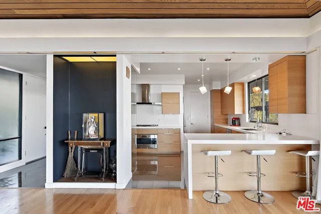 a bedroom with a bed and a table