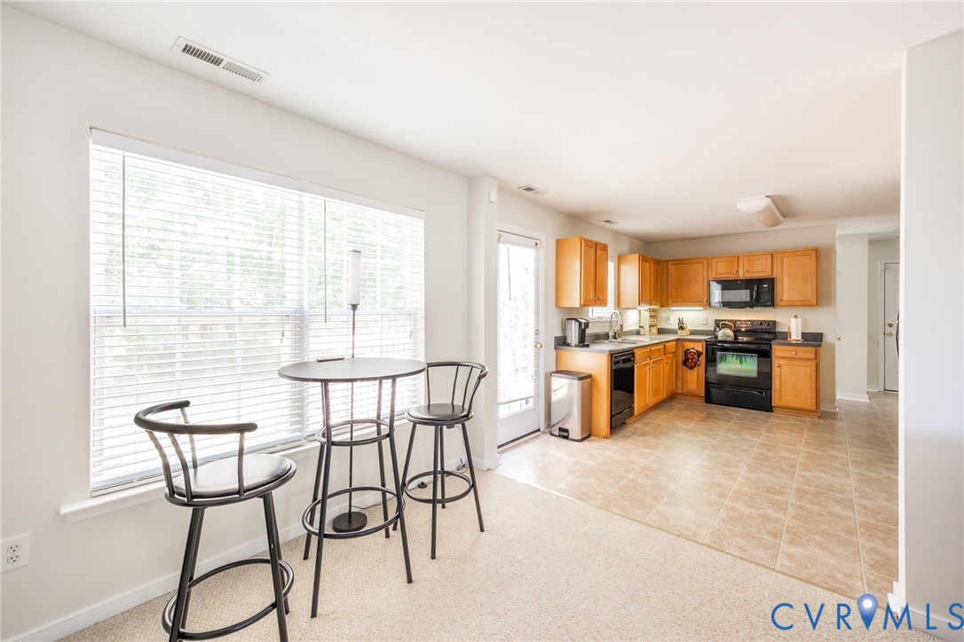 2928 Heather Ridge Drive Henrico, VA 23231 - Photo 12 of 34 Open-concept kitchen and dining area featuring lig