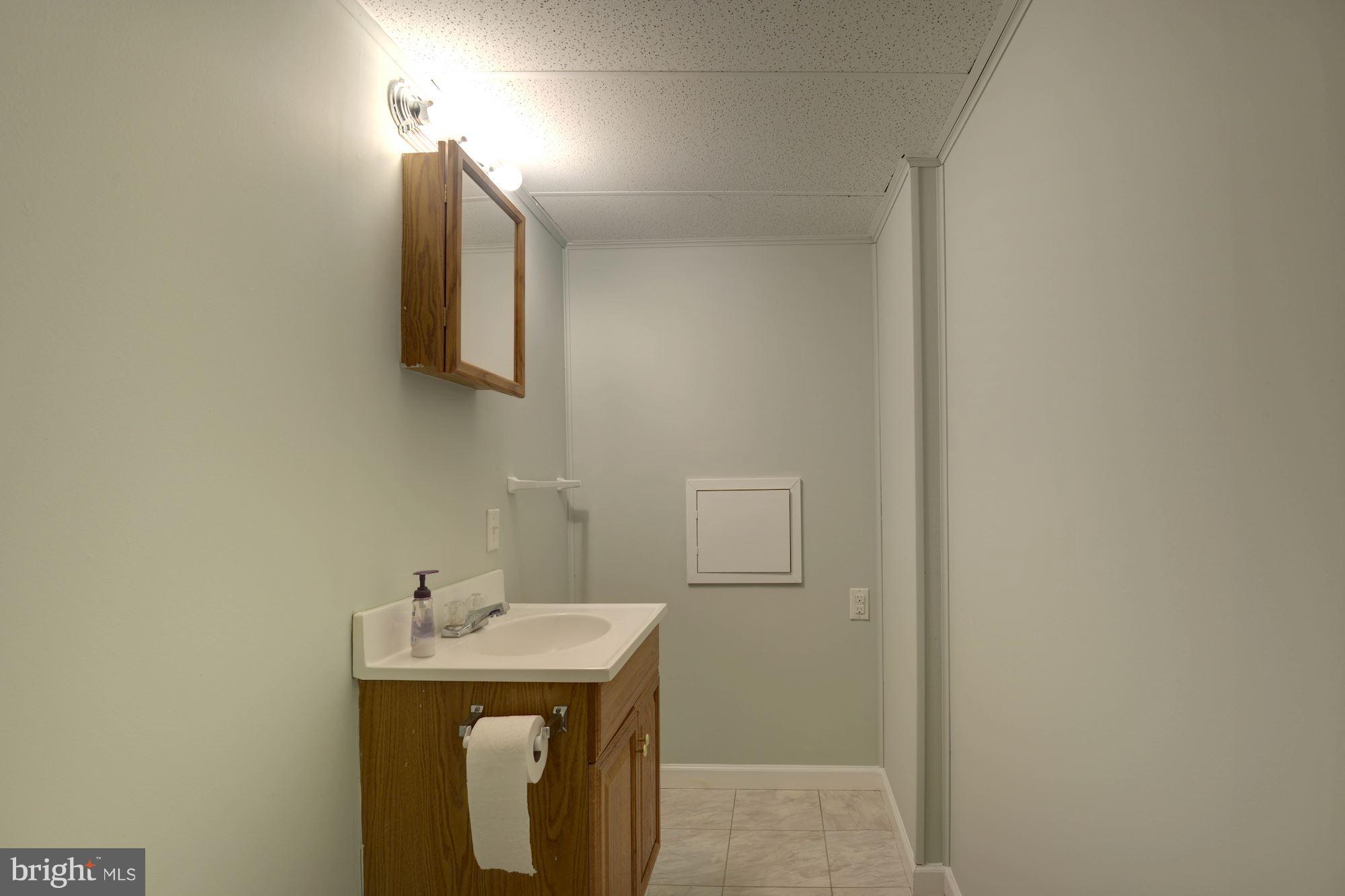 3404 Burgundy Road Alexandria, VA 22303 - Photo 22 of 30 Half bath off the Rec Room in basement