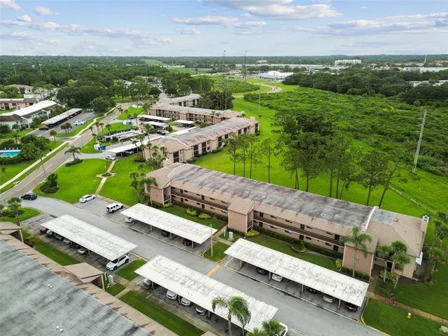 an aerial view of a house with a garden