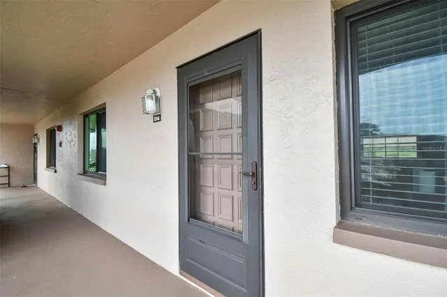 a kitchen with granite countertop a sink and a stove