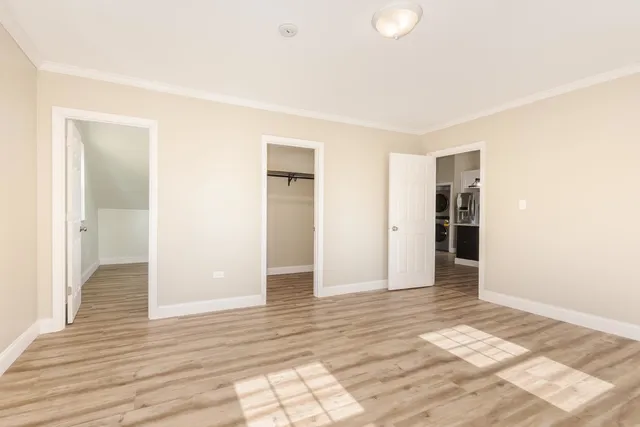 a view of an empty room and window