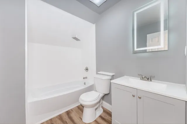 a bathroom with a sink toilet and bathtub