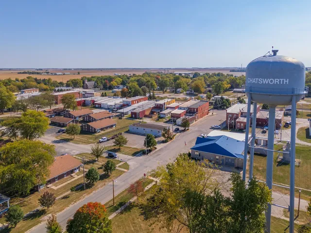 an aerial view of a house with a lake view