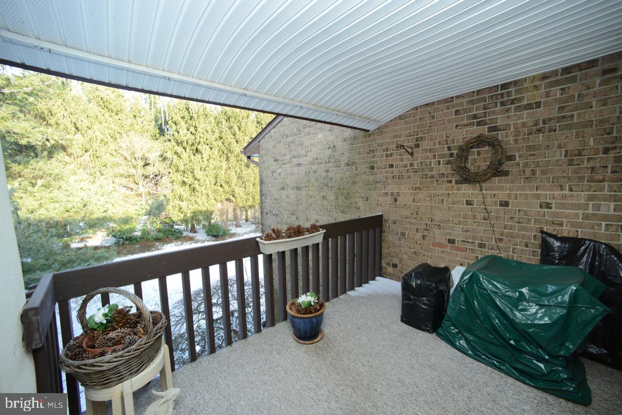 203 Raintree Lane, Unit 203 Malvern, PA 19355 - Photo 21 of 25 Balcony off of Living Room