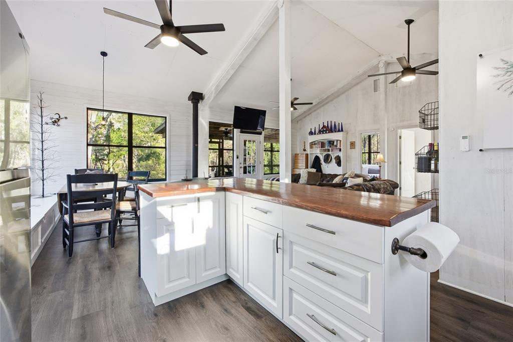 0 Clayton Road Cedar Key, FL 32625 - Photo 5 of 19 a very nice looking living room with wooden floor and furniture