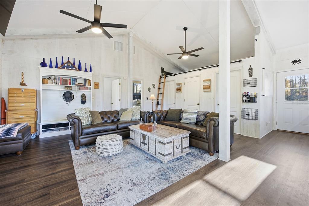 0 Clayton Road Cedar Key, FL 32625 - Photo 6 of 22 a living room with furniture and wooden floor