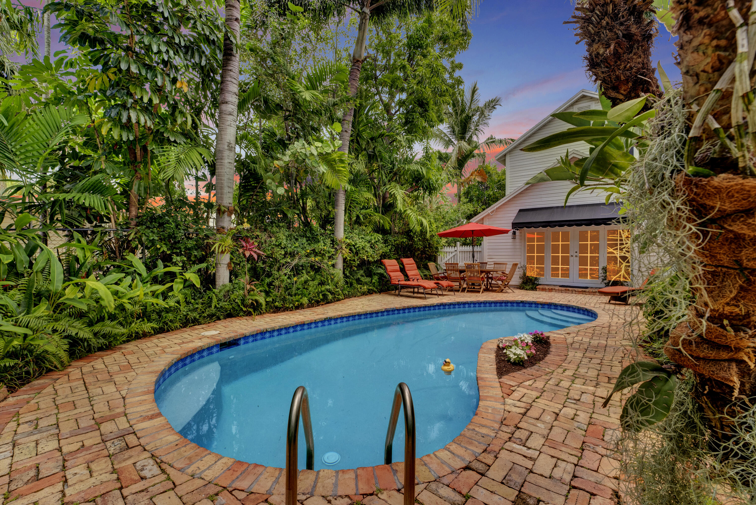 306 North Swinton Avenue Delray Beach, FL 33444 - Photo 11 of 53 a view of swimming pool with seating space