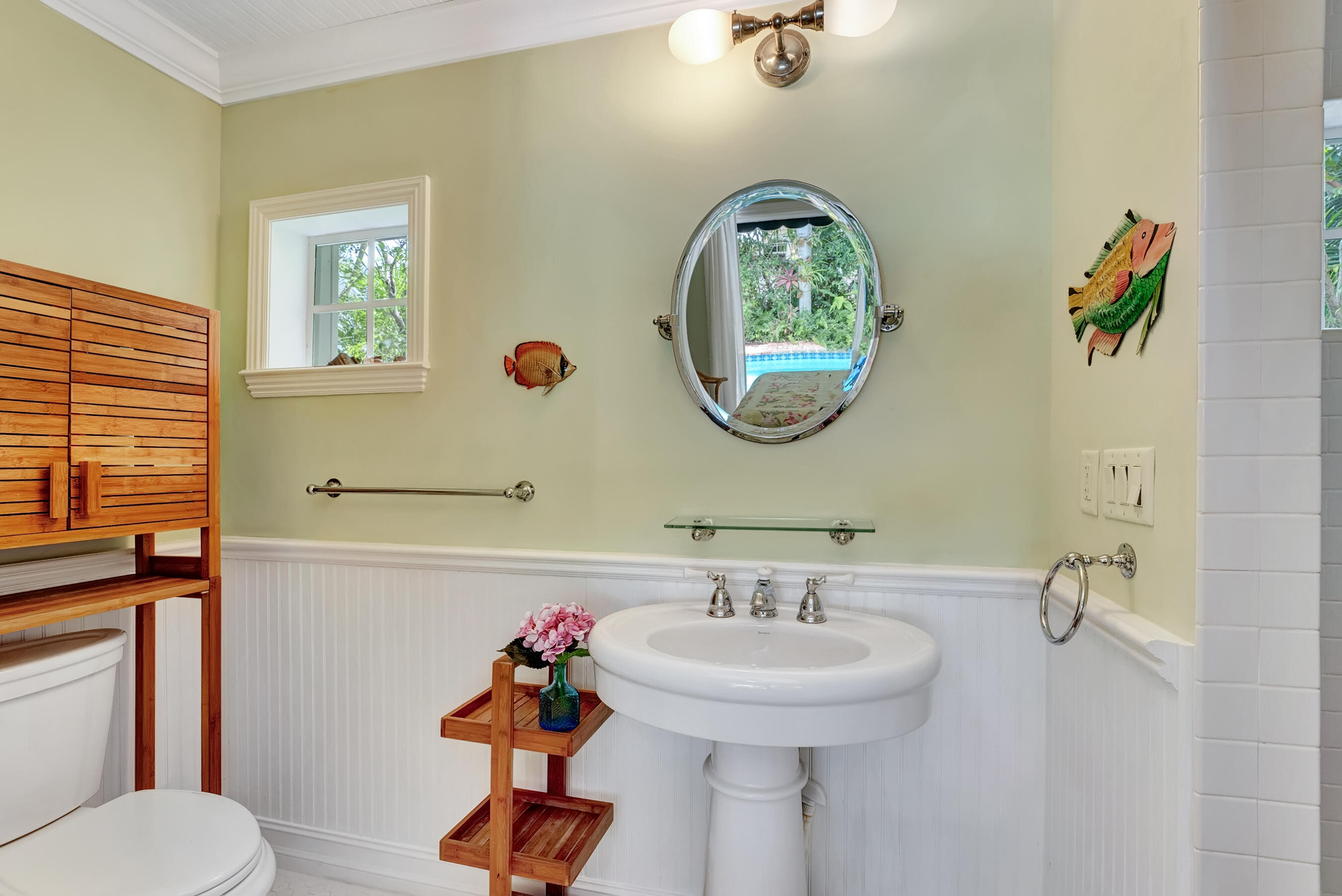 306 North Swinton Avenue Delray Beach, FL 33444 - Photo 16 of 53 a bathroom with a sink and a mirror
