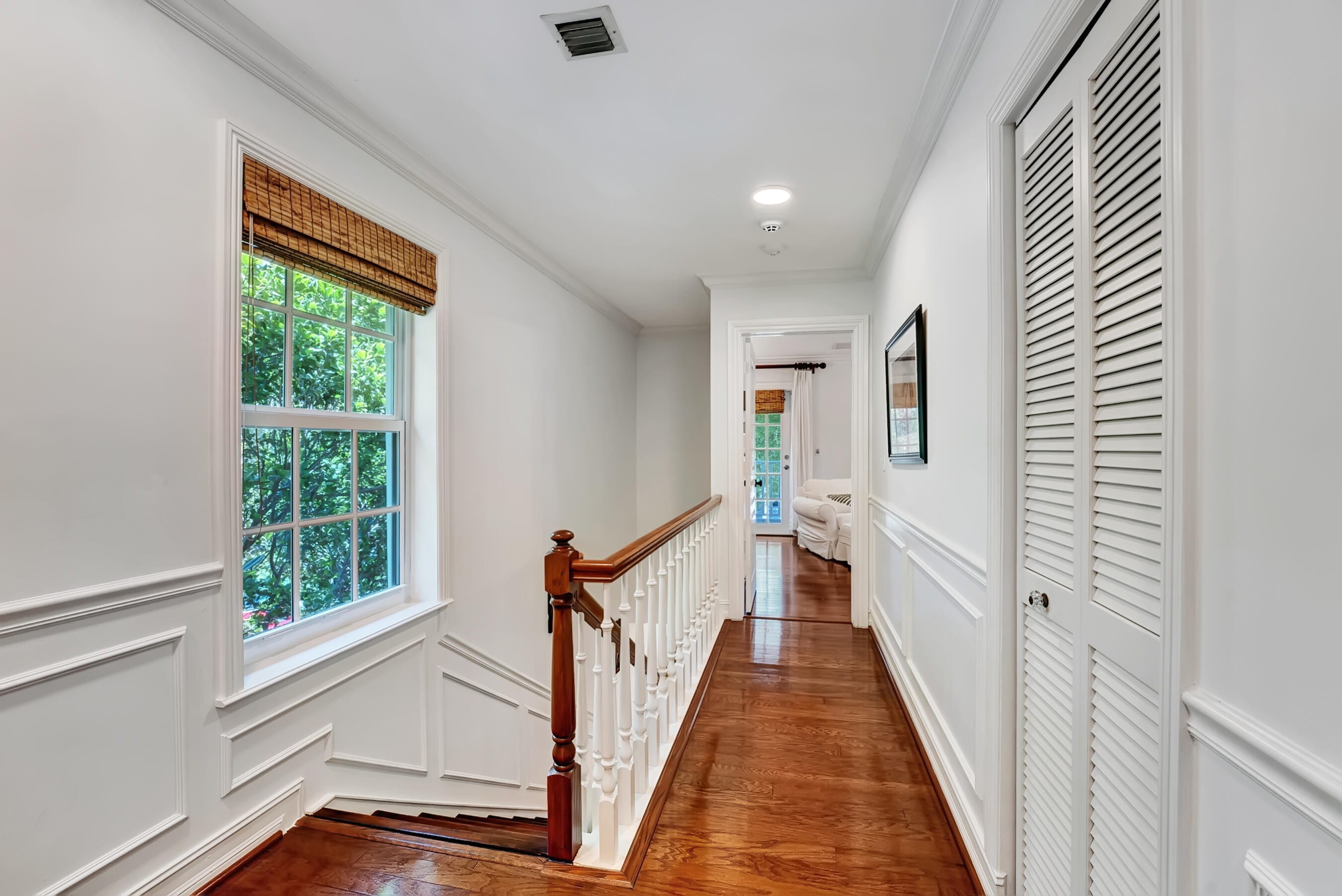 306 North Swinton Avenue Delray Beach, FL 33444 - Photo 18 of 53 a view of a hallway with wooden floor and staircase