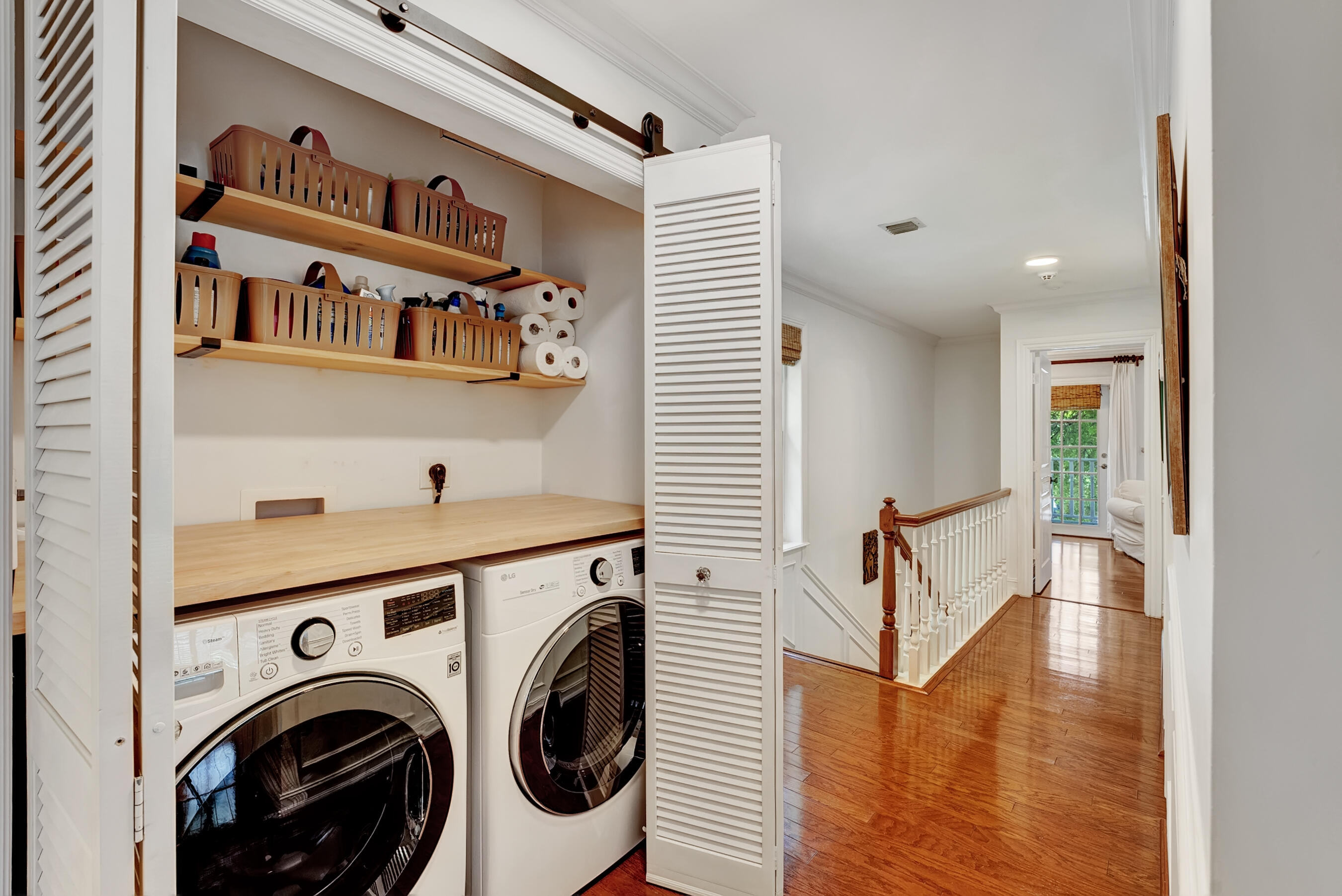 306 North Swinton Avenue Delray Beach, FL 33444 - Photo 19 of 53 a view of a hallway with washer and dryer