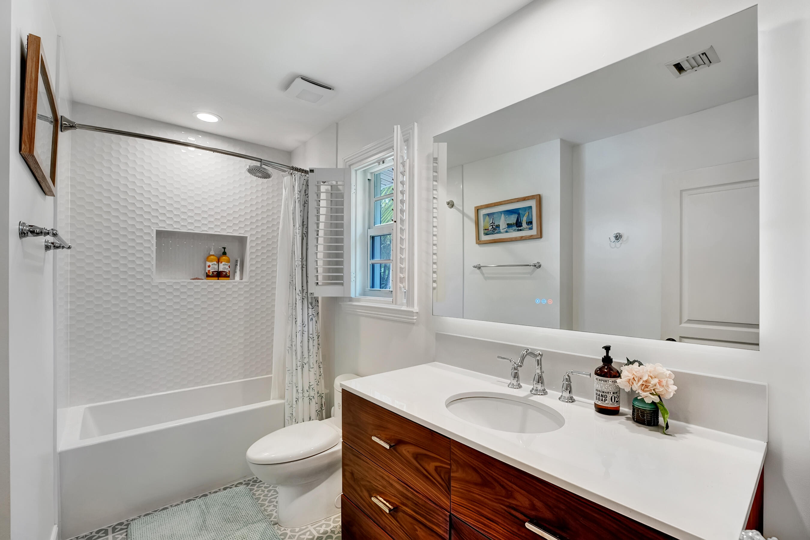 306 North Swinton Avenue Delray Beach, FL 33444 - Photo 22 of 53 a bathroom with a sink a toilet and shower