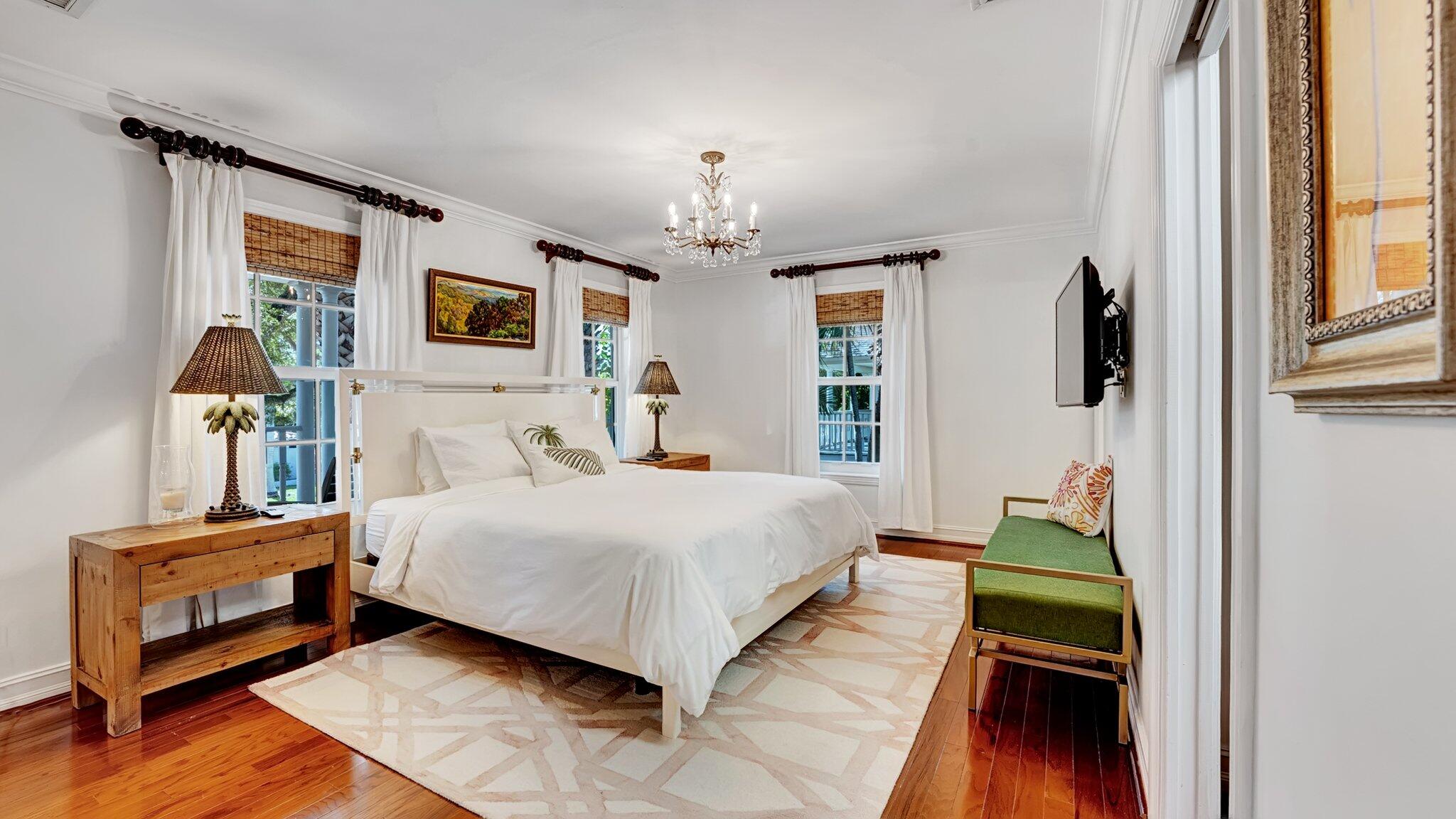 306 North Swinton Avenue Delray Beach, FL 33444 - Photo 28 of 53 a bedroom with a bed and a window