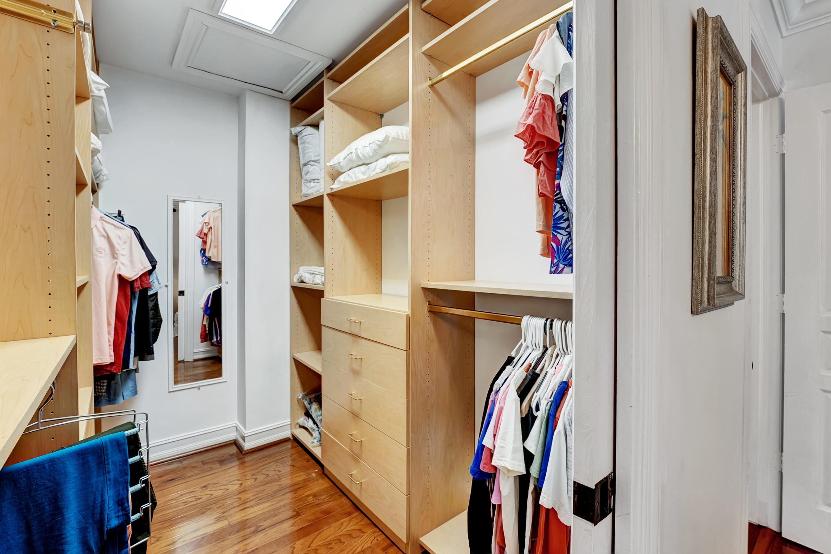 306 North Swinton Avenue Delray Beach, FL 33444 - Photo 34 of 53 a view of walk in closet with clothes and shoes