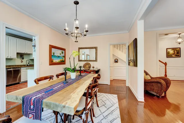 a workspace room with furniture and wooden floor