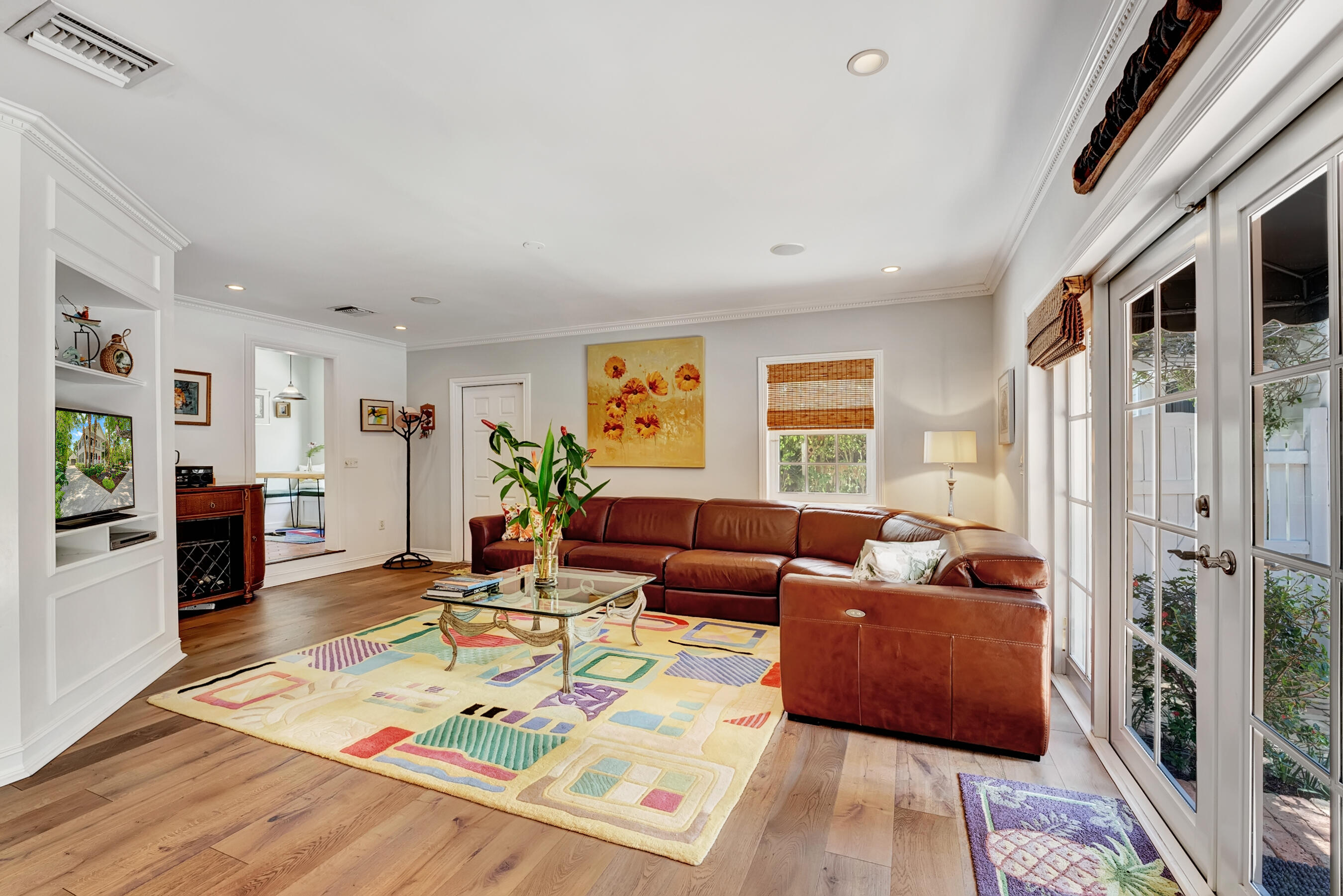 306 North Swinton Avenue Delray Beach, FL 33444 - Photo 43 of 53 a living room with furniture fireplace and a window