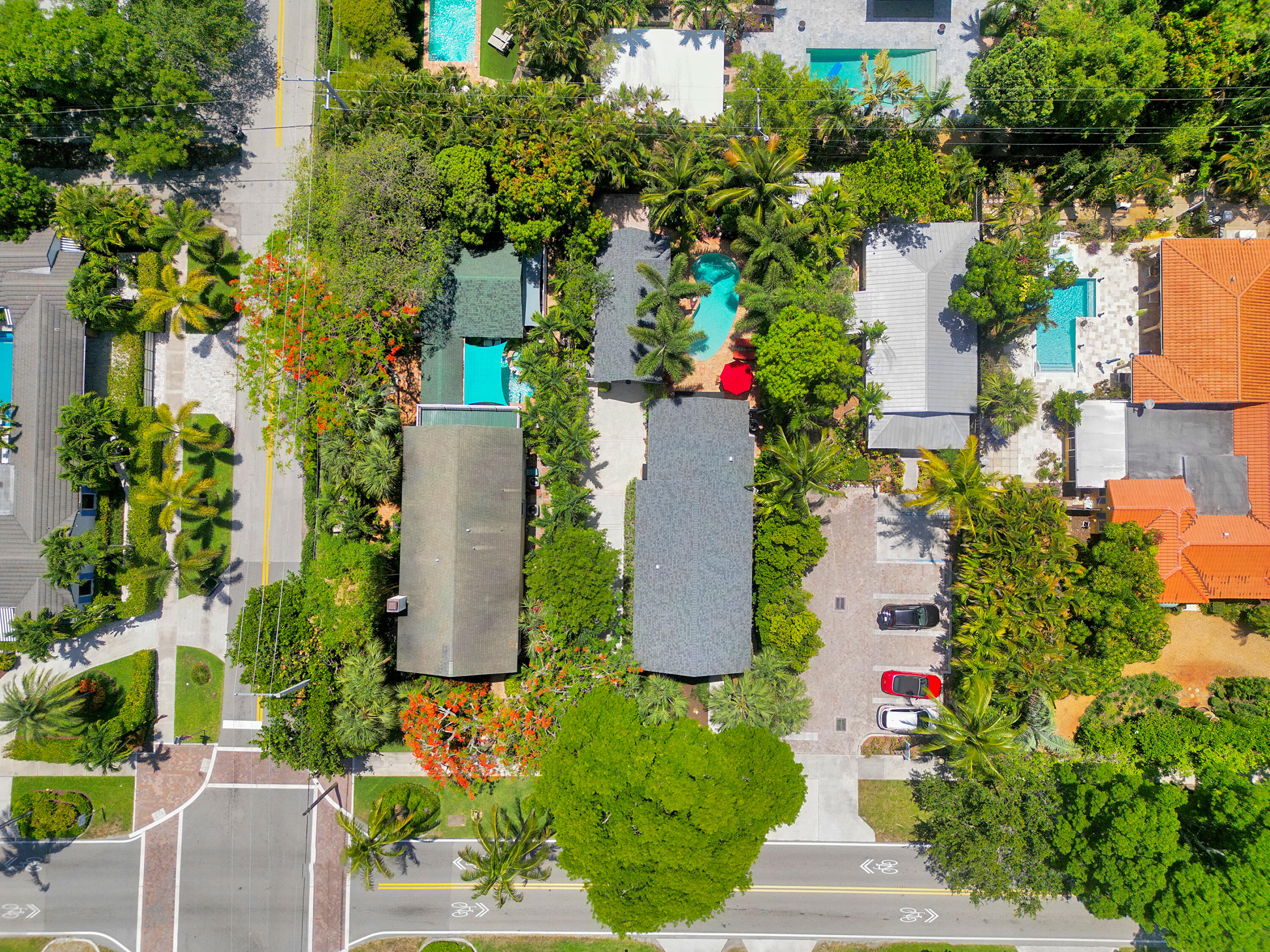 306 North Swinton Avenue Delray Beach, FL 33444 - Photo 48 of 53 an aerial view of a house with a yard and fountain