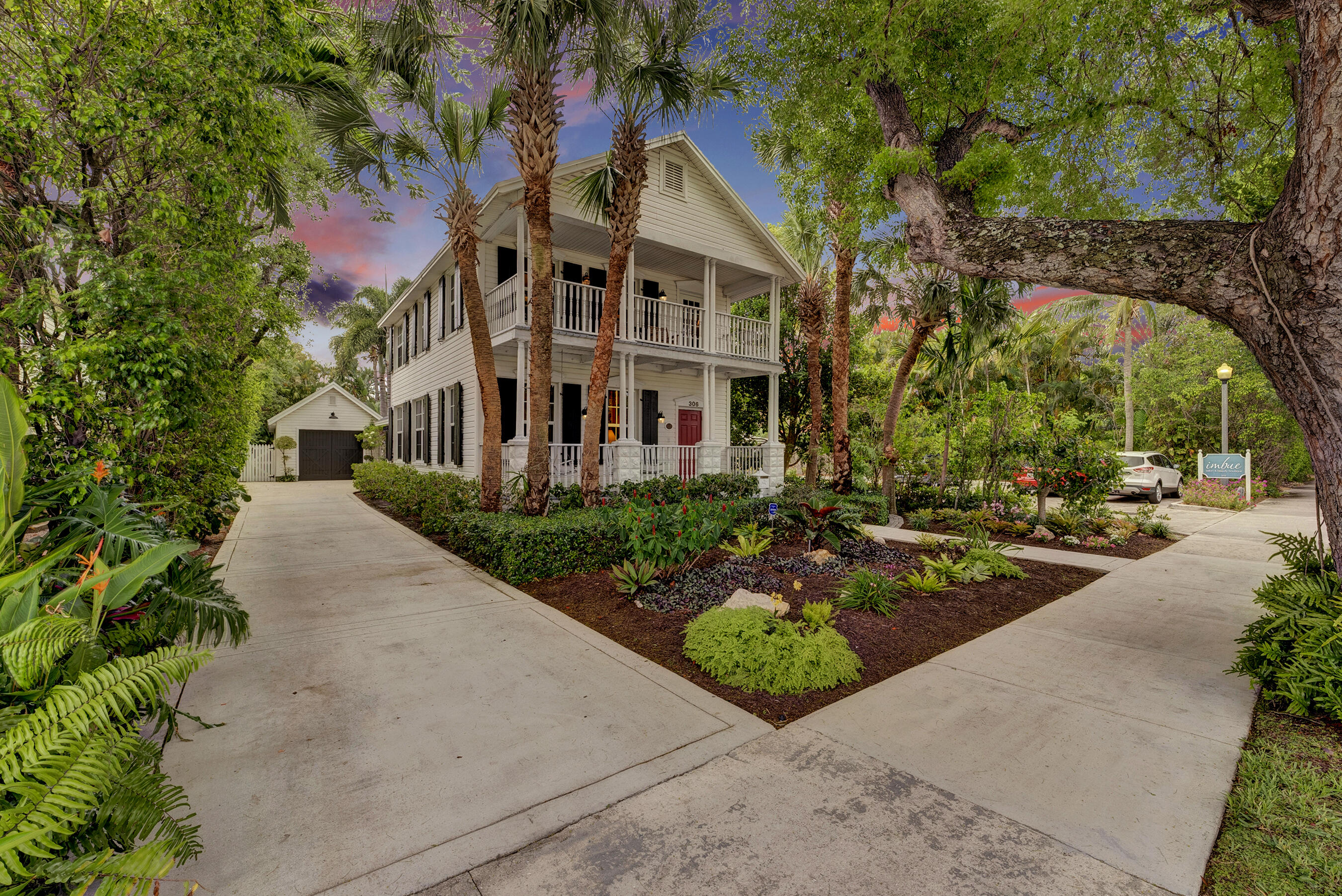 306 North Swinton Avenue Delray Beach, FL 33444 - Photo 49 of 53 a front view of a multi story residential apartment buildings