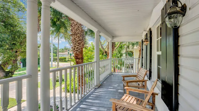 a view of a porch with wooden floor and outdoor space