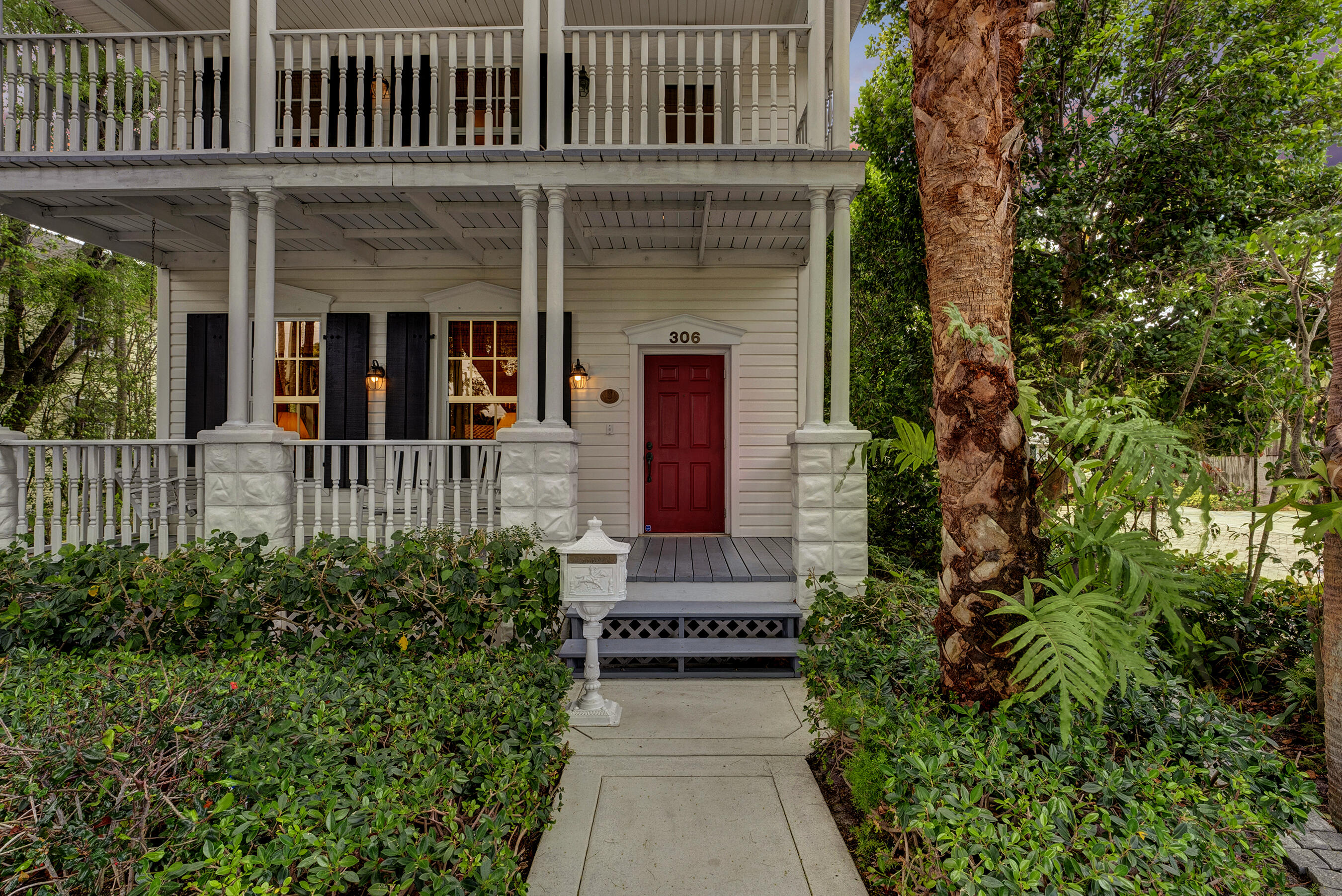306 North Swinton Avenue Delray Beach, FL 33444 - Photo 8 of 53 front view of a house with potted plants